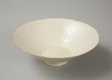 Lobed bowl with qingbai glaze with carved floral design made in the Northern Song dynasty