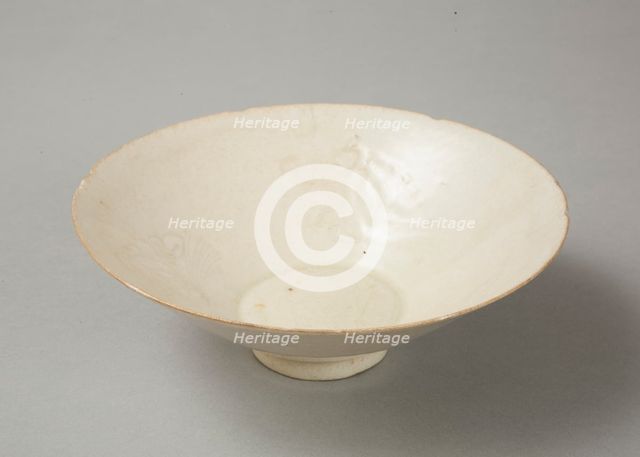 Lobed bowl with qingbai glaze with carved floral design made in the Northern Song dynasty. Artist: Unknown.