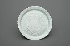 Lobed Dish with Lotus Scrolls, Yuan dynasty (1271-1368), first half of the 14th century. Creator: Unknown