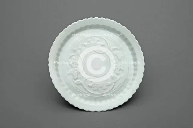Lobed Dish with Lotus Scrolls, Yuan dynasty (1271-1368), first half of the 14th century. Creator: Unknown.