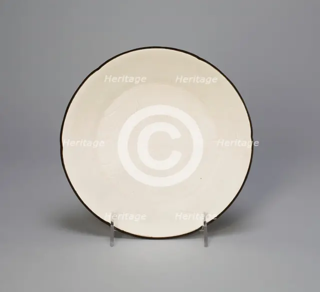 Lobed Dish with Lotus Sprays and Curled Feather-Like Leaves, Northern Song dynasty, 11th century. Creator: Unknown.