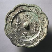 Lobed Mirror with Acrobats on Lotus Blossoms, early 7th Century - early 10th Century. Creator: Unknown