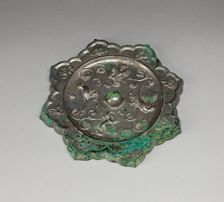 Lobed Mirror with Birds, Insects, and Floral Sprays, Tang dynasty (A.D. 618-907), 8th century. Creator: Unknown