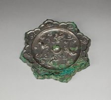 Lobed Mirror with Birds, Insects, and Floral Sprays, Tang dynasty (A.D. 618-907), 8th century. Creator: Unknown