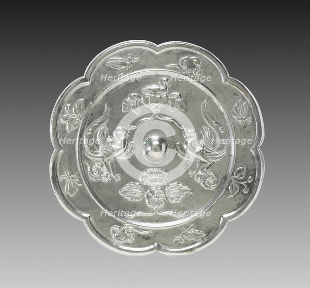 Lobed Mirror with Paired Phoenixes, a Nestling Bird, and a Lotus Blossom, 700s. Creator: Unknown.