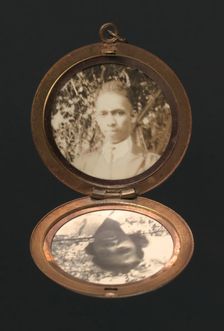 Locket with photographs of Harriette and Harry T. Moore, early to mid 20th century. Creator: Unknown