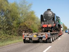 Locomotive being transported by heavy goods vehicle on A31 2015. Creator: Unknown