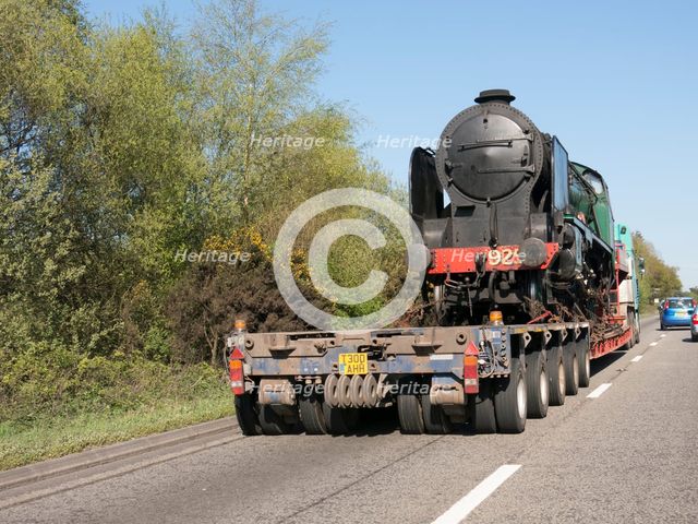 Locomotive being transported by heavy goods vehicle on A31 2015. Creator: Unknown.