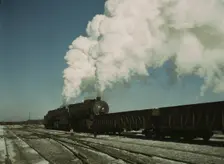 Locomotive in a railroad yard, Chicago and Northwestern RR (?), near Chicago, Ill.(?), 1942 or 1943. Creator: Jack Delano