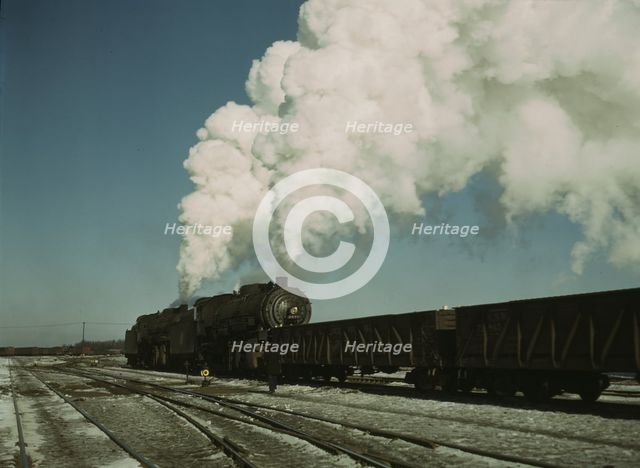 Locomotive in a railroad yard, Chicago and Northwestern RR (?), near Chicago, Ill.(?), 1942 or 1943. Creator: Jack Delano.