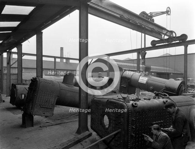 Locomotive repairs, Doncaster, South Yorkshire, 1959.  Creator: Michael Walters.