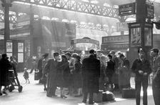 Locomotive spotters at Victoria Station, London, 1950. Creator: Henry Grant