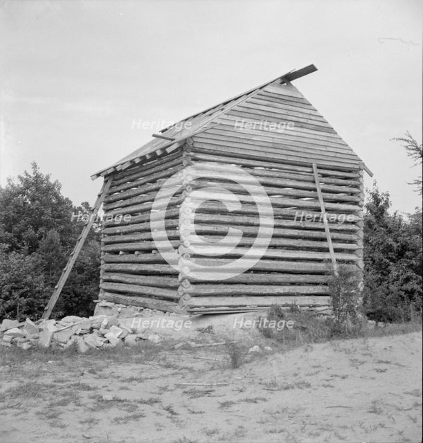 Log cabin barn under construction, near Concord, Person County, North Carolina, 1939. Creator: Dorothea Lange.