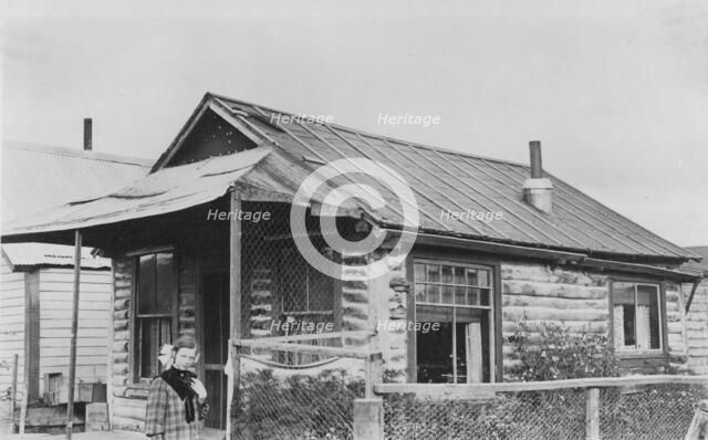 Log cabin, between c1900 and 1916. Creator: Unknown.