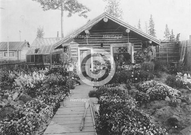 Log cabin, between c1900 and 1923. Creator: Unknown.