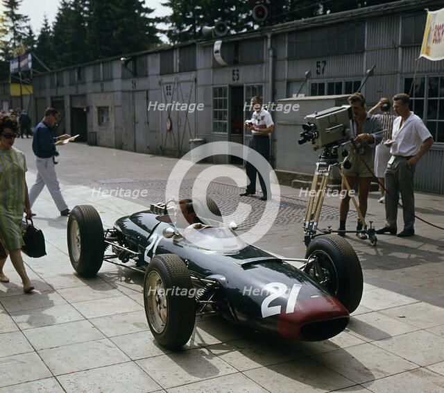Lola Coventry Climax, Chris Amon being filmed 1963 German grand Prix. Creator: Unknown.