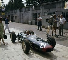 Lola Coventry Climax, Chris Amon being filmed 1963 German grand Prix. Creator: Unknown