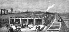 London Main Drainage: Constructing the concrete embankment across the Plaistow Marshes..., 1861. Creator: Unknown