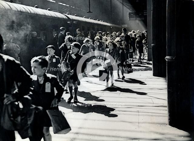 London schoolchildren being evacuated, Euston Station, World War II, 6 July 1944. Artist: Unknown