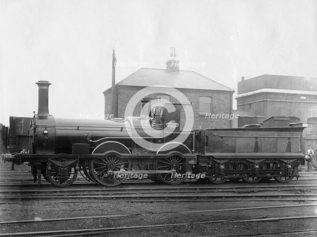 London & South Western Railway (LSWR) Locomotive No 148, 'Colne' with its tender, c1880. Creator: Unknown.