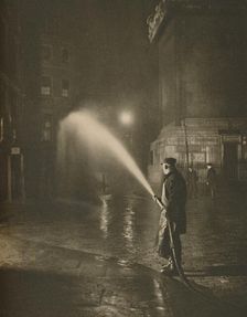 London's Nightly Cleaning: Scene at the Base of the Monument c1935. Creator: Unknown