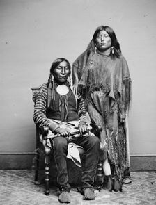 Lone Wolf and his wife Etla, Kiowa Indians, between 1855 and 1865. Creator: Unknown