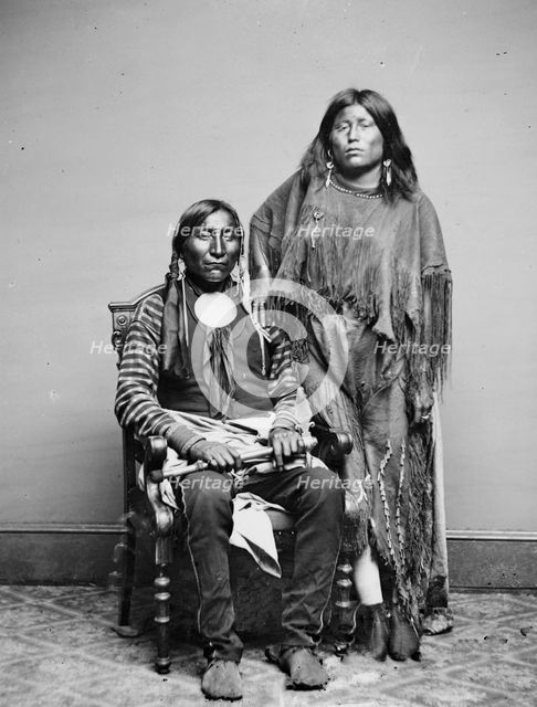Lone Wolf and his wife Etla, Kiowa Indians, between 1855 and 1865. Creator: Unknown.