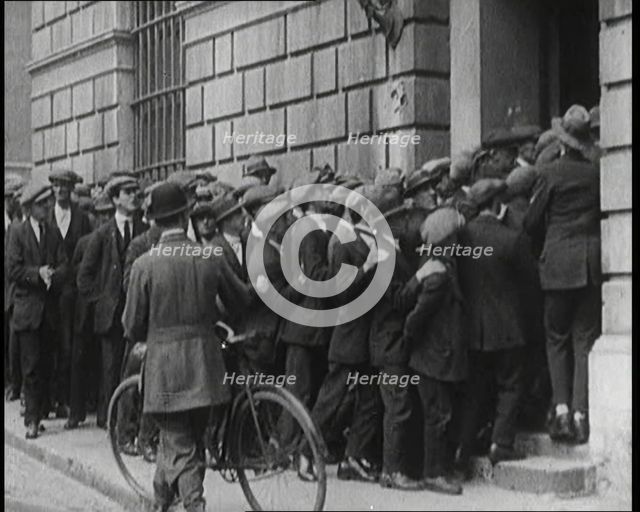 Long Queues of Irish Men Waiting to Enlist in the New Free State Army, 1922. Creator: British Pathe Ltd.