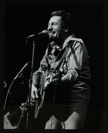 Lonnie Donegan on stage at the Forum Theatre, Hatfield, Hertfordshire, April 1979. Creator: Denis Williams