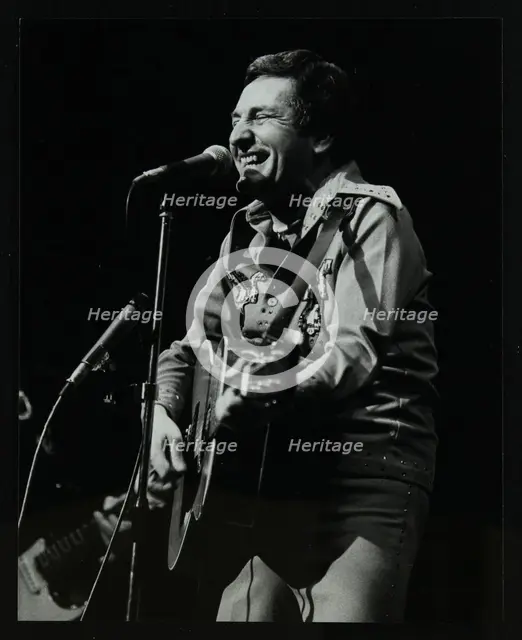 Lonnie Donegan on stage at the Forum Theatre, Hatfield, Hertfordshire, April 1979. Creator: Denis Williams.