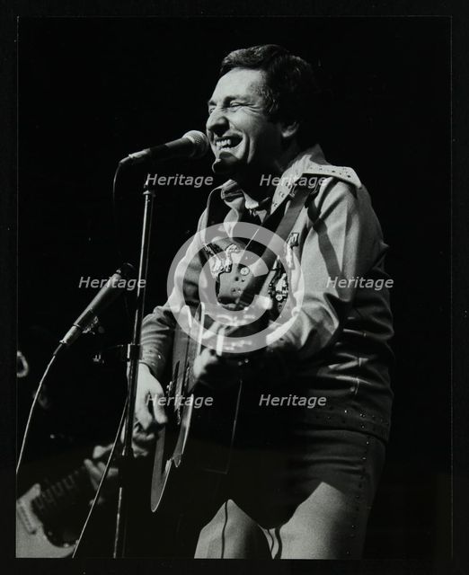Lonnie Donegan on stage at the Forum Theatre, Hatfield, Hertfordshire, April 1979. Creator: Denis Williams.