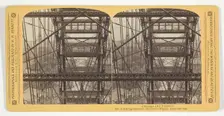 Looking through the Ferris Wheel, near the top, 1893. Creator: Henry Hamilton Bennett