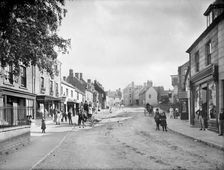 Looking up Church Street with people in the street and outside shop premises, Charlbury, Oxon, 1888. Creator: Henry Taunt