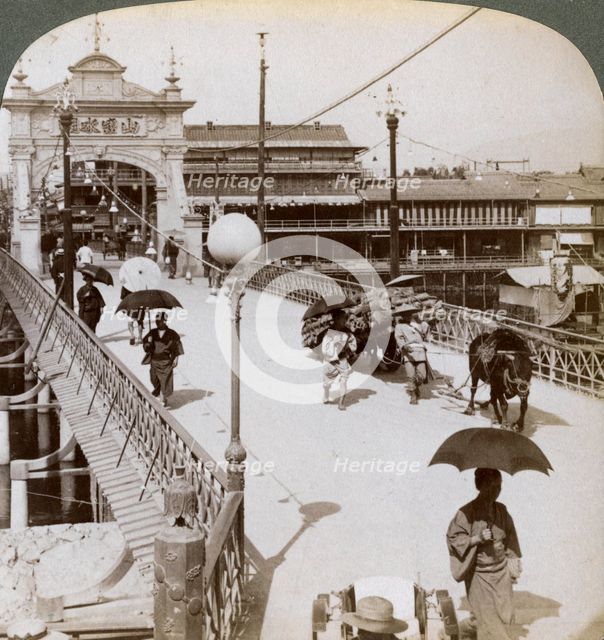 Looking west over the Kamo River (Kamogawa) at Shijo bridge, Kyoto, Japan, 1904.Artist: Underwood & Underwood