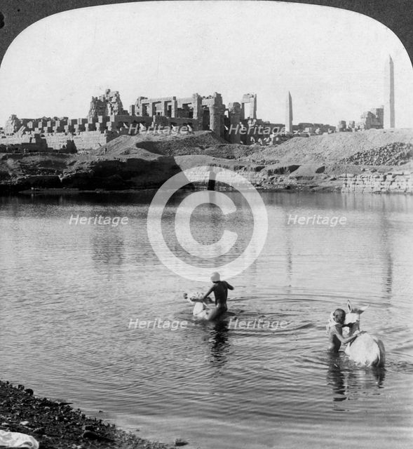 'Looking across the Sacred Lake to the great temple at Karnak, Thebes, Egypt', 1905.Artist: Underwood & Underwood