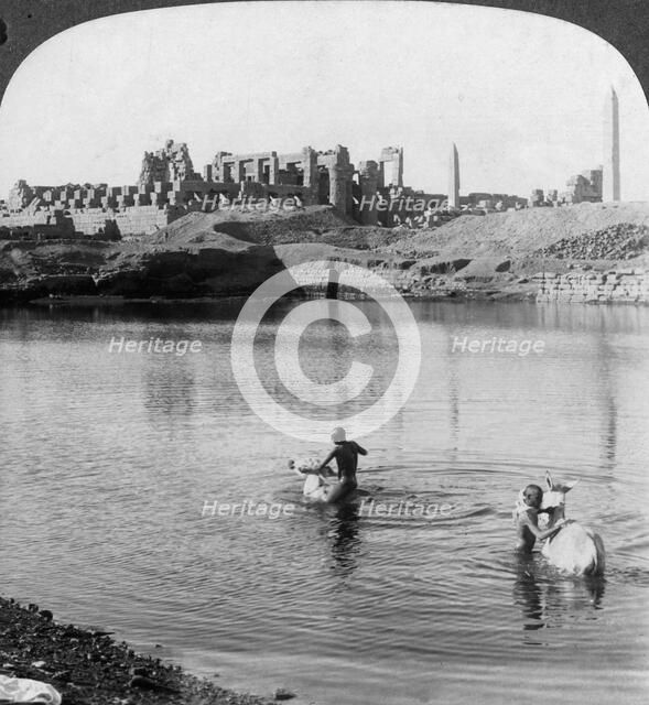 'Looking across the Sacred Lake to the great temple at Karnak, Thebes, Egypt', 1905.Artist: Underwood & Underwood