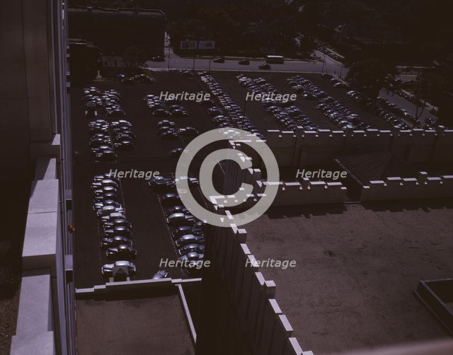 Looking down on a parking lot from the rear of the Fisher Building, Detroit, Mich., 1942. Creator: Arthur S Siegel.