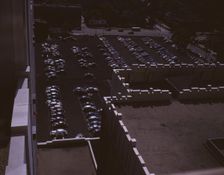 Looking down on a parking lot from the rear of the Fisher Building, Detroit, Mich., 1942. Creator: Arthur S Siegel