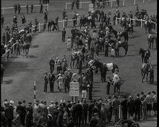 Looking Down Into One of the Enclosures at Goodwood Race Course in Sussex with Spectators..., 1939. Creator: British Pathe Ltd