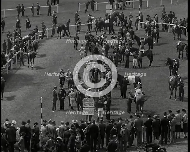 Looking Down Into One of the Enclosures at  Goodwood Race Course in Sussex with Spectators..., 1939. Creator: British Pathe Ltd.