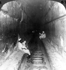 Looking down the main passage to Khufu's sepulchre within the Great Pyramid, Egypt 1905.Artist: Underwood & Underwood