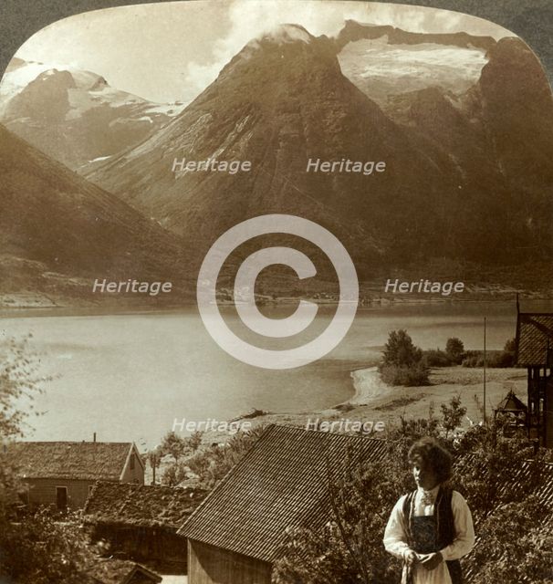 'Looking from Hjelle across quiet Strynns Lake to steep glaciers of Mt. Skaala, Norway', c1905. Creator: Unknown.