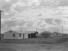 Looking from the camp to adjoining tract, Shafter migrant camp, California, 1938. Creator: Dorothea Lange