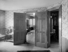 Looking into kitchen, probably in clubhouse, New York City, between 1900 and 1910. Creator: Unknown