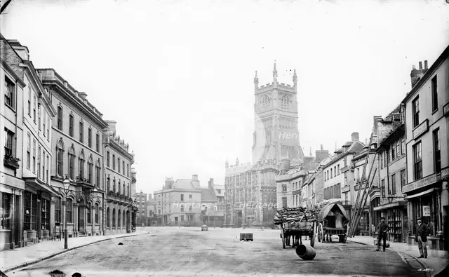 Looking into the Market Place towards St John the Baptist's Church, Cirencester, Glos, 1860-1922.  Creator: Henry Taunt.
