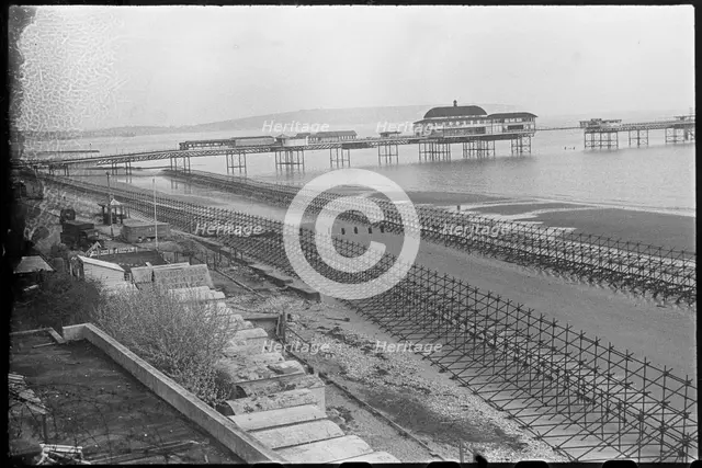 Looking north-east over the beach at Shanklin, showing Admiralty scaffolding, Isle Of Wight, 1945. Creator: George R Long.