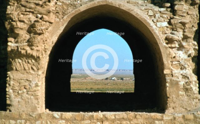 Looking out through an arch, fortress of Al Ukhaidir, Iraq, 1977. Creator: Vivienne Sharp.