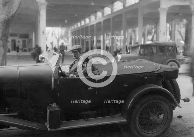 Lord de Clifford and Kitty Brunell in a Lagonda, San Remo, Italy, c1930(?). Artist: Bill Brunell.