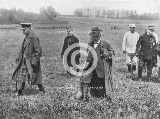 'Lord Kitchener's visit to the front: Lord Kitcheneer, M. Millerand, and General Joffre leaving afte Artist: Unknown.
