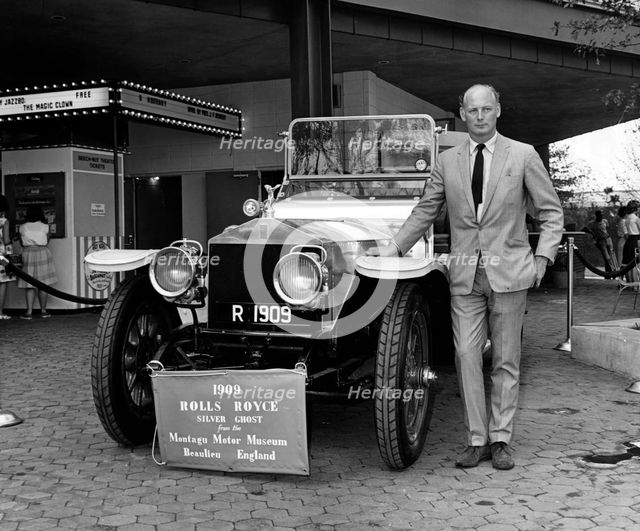 Lord Montagu with 1909 Rolls - Royce Silver Ghost at 1964 World's Fair, New York. Creator: Unknown.